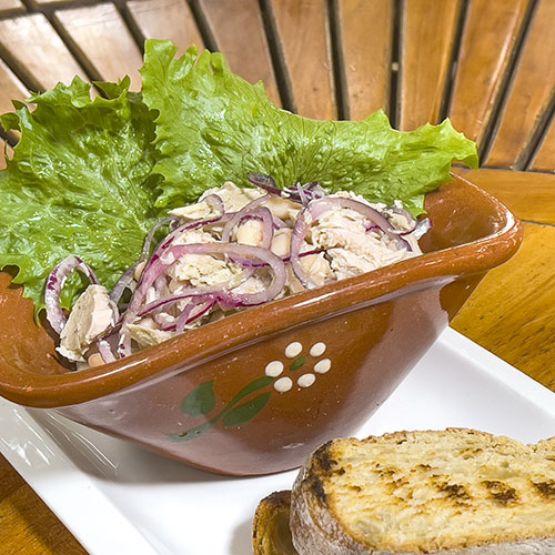 PalmBeach Tropical Restaurant | Homemade Salad | homemade tuna in oil with red onions, white beans and toasted bread croutons