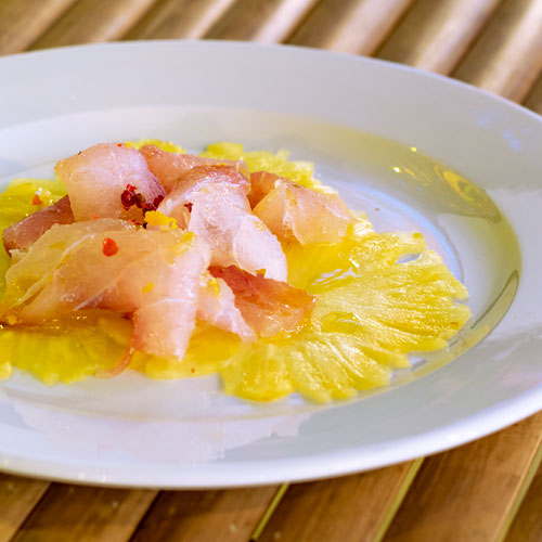 PalmBeach Tropical Restaurant | Marinated Sashimi and Pineapple | amberjack or grouper depending on availability, pineapple, extra virgin olive oil, pink pepper and spices